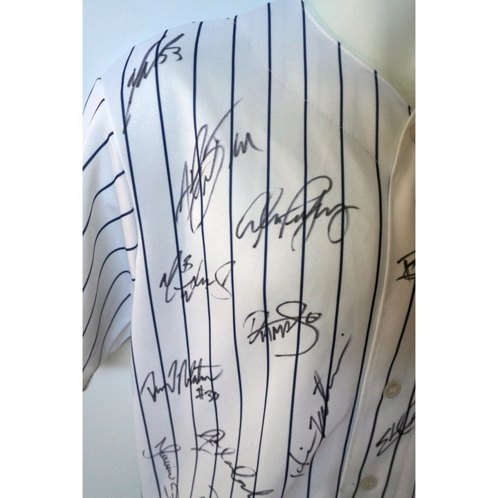 2009 New York Yankees Derek Jeter, Mariano Rivera, Hideki Matsui, World Series champions team signed jersey with proof