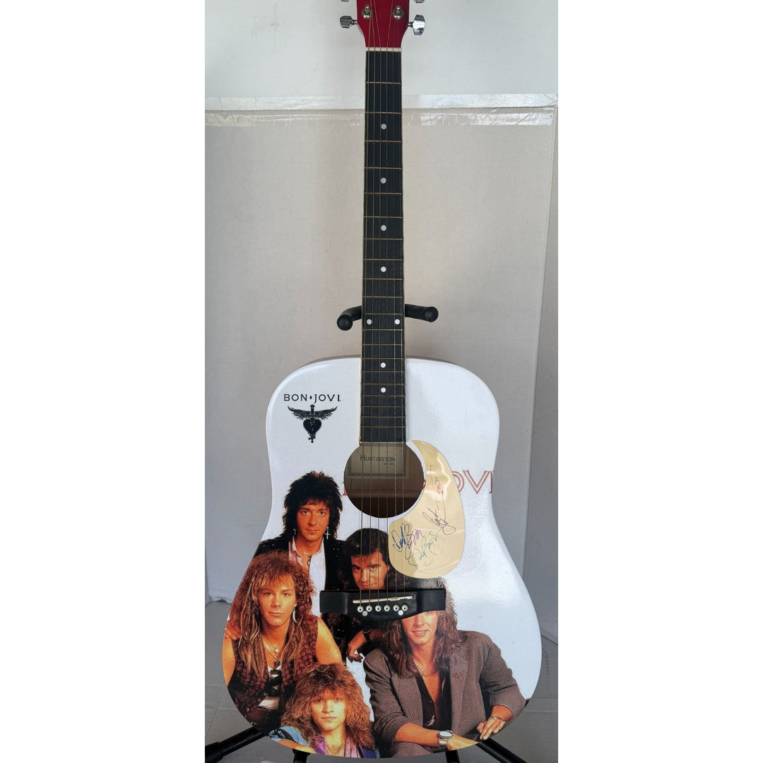 Jon Bon Jovi, Richie Sambora, Tico Torres, David Bryan Bon Jovi one of a kind acoustic guitar signed with proof.