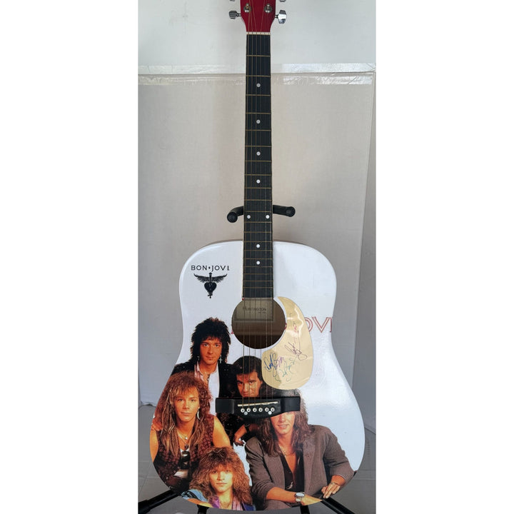 Jon Bon Jovi, Richie Sambora, Tico Torres, David Bryan Bon Jovi one of a kind acoustic guitar signed with proof.