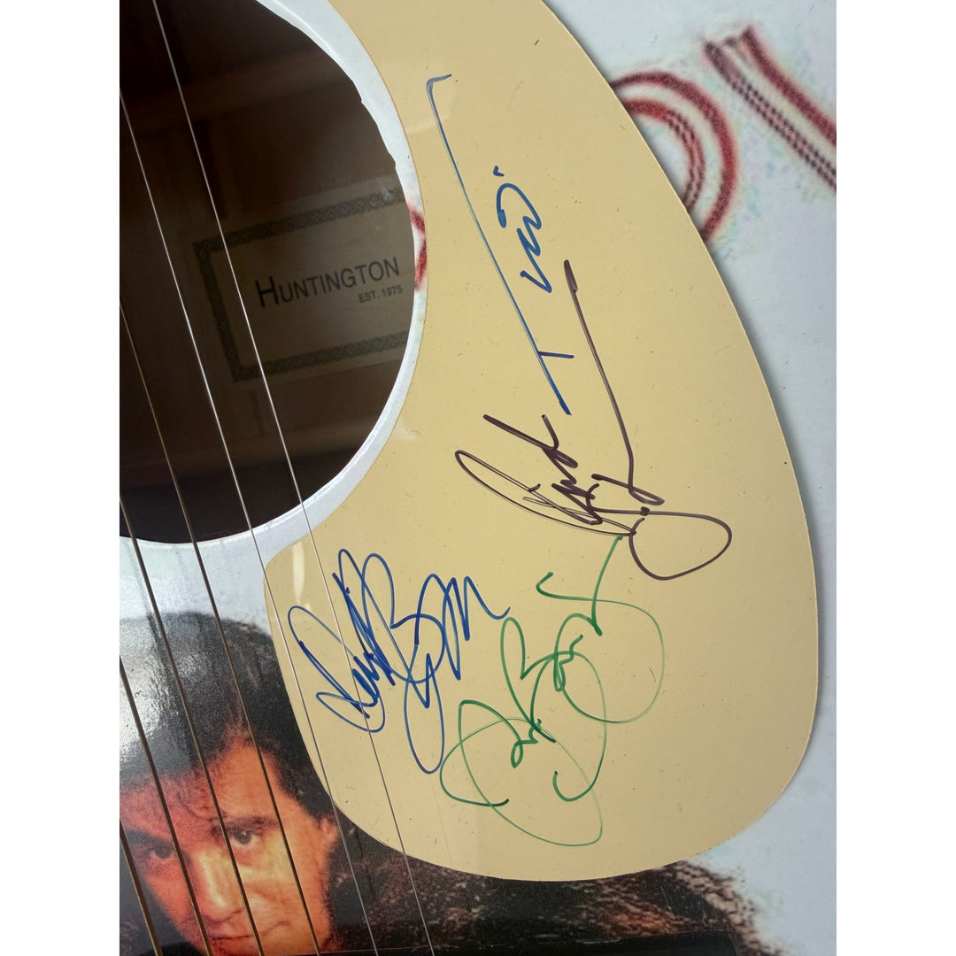 Jon Bon Jovi, Richie Sambora, Tico Torres, David Bryan Bon Jovi one of a kind acoustic guitar signed with proof.