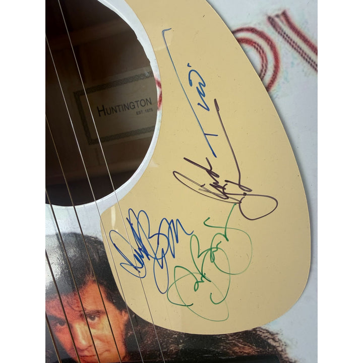 Jon Bon Jovi, Richie Sambora, Tico Torres, David Bryan Bon Jovi one of a kind acoustic guitar signed with proof.