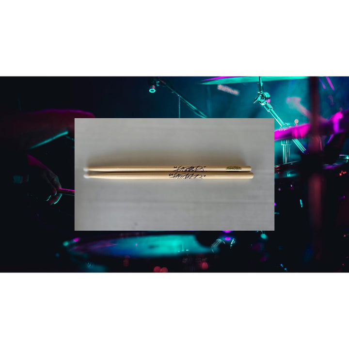 Charlie Watts of Rolling Stones Drumsticks signed with proof.
