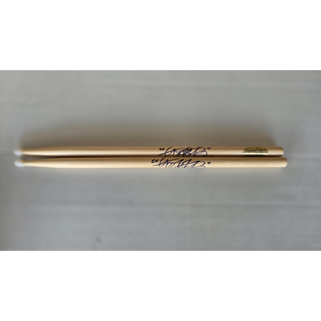 Charlie Watts of Rolling Stones Drumsticks signed with proof.