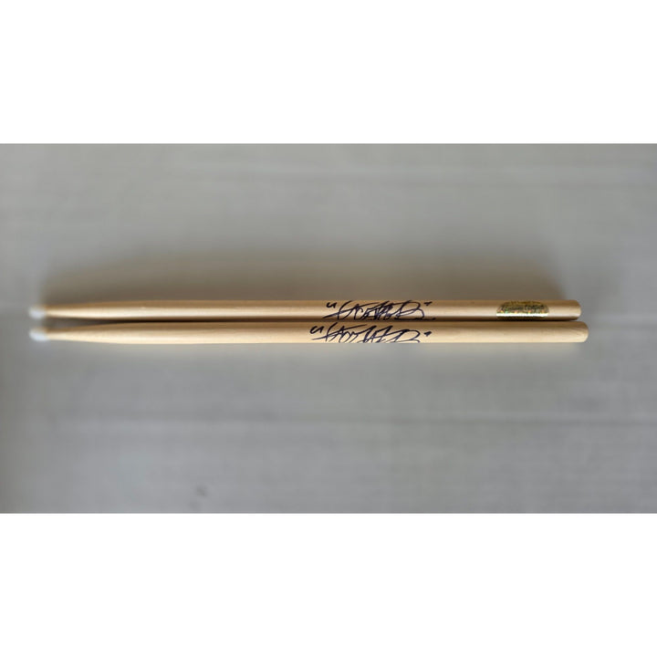Charlie Watts of Rolling Stones Drumsticks signed with proof.