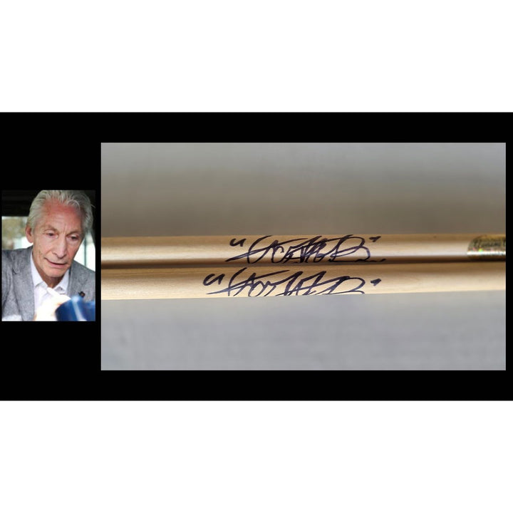 Charlie Watts of Rolling Stones Drumsticks signed with proof.