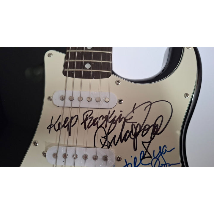 Joan Jett & Lita Ford signed with inscriptions authentic Fender Stratocaster electric guitar signed with proof
