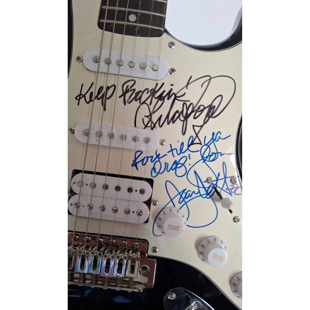 Joan Jett & Lita Ford signed with inscriptions authentic Fender Stratocaster electric guitar signed with proof