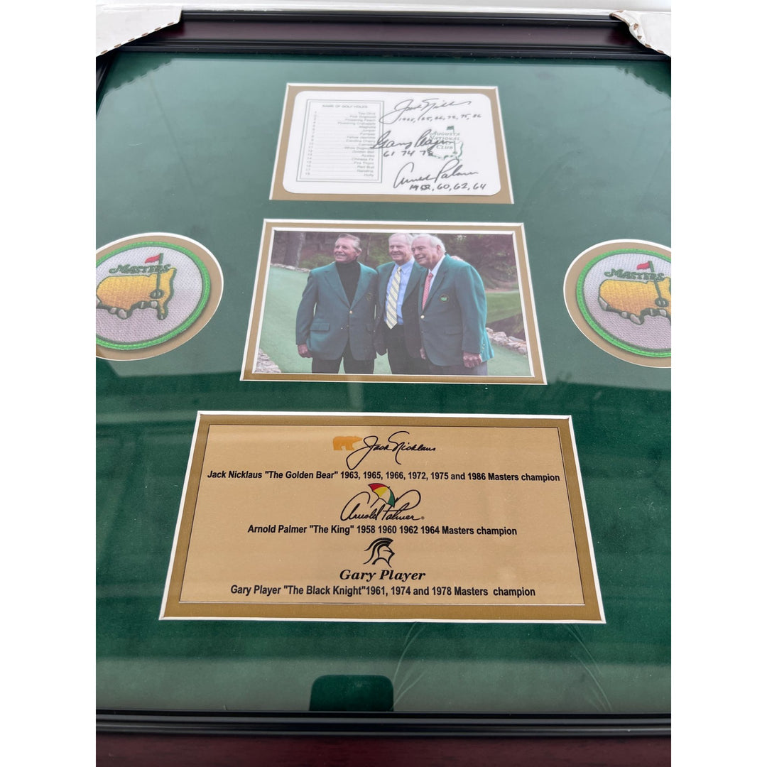 Jack Nichlaus Arnold Palmer Gary Player Masters golf tourney official score card signed with proof and museum quality frame.