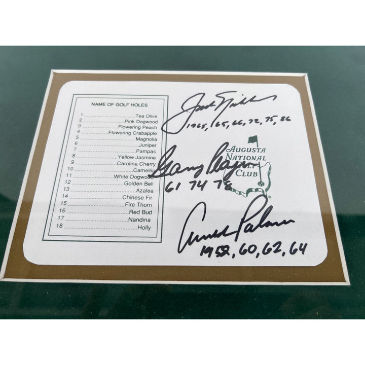 Jack Nichlaus Arnold Palmer Gary Player Masters golf tourney official score card signed with proof and museum quality frame.