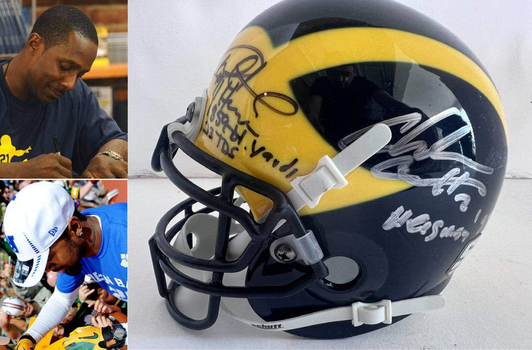 University of Michigan Heisman Trophy award winners Charles Woodson and Desmond Howard Riddell mini helmet signed with proof