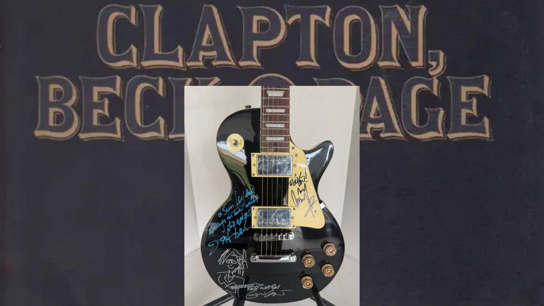 The  Yardbirds Jimmy Page Eric Clapton & Jeff Beck vintage black Les Paul Electric Guitar signed with proof.