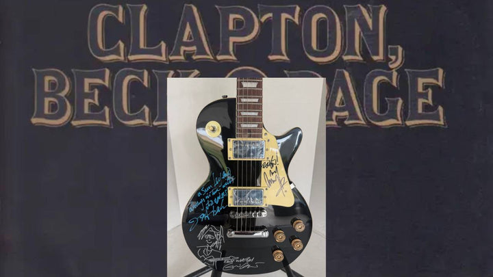 The  Yardbirds Jimmy Page Eric Clapton & Jeff Beck vintage black Les Paul Electric Guitar signed with proof.