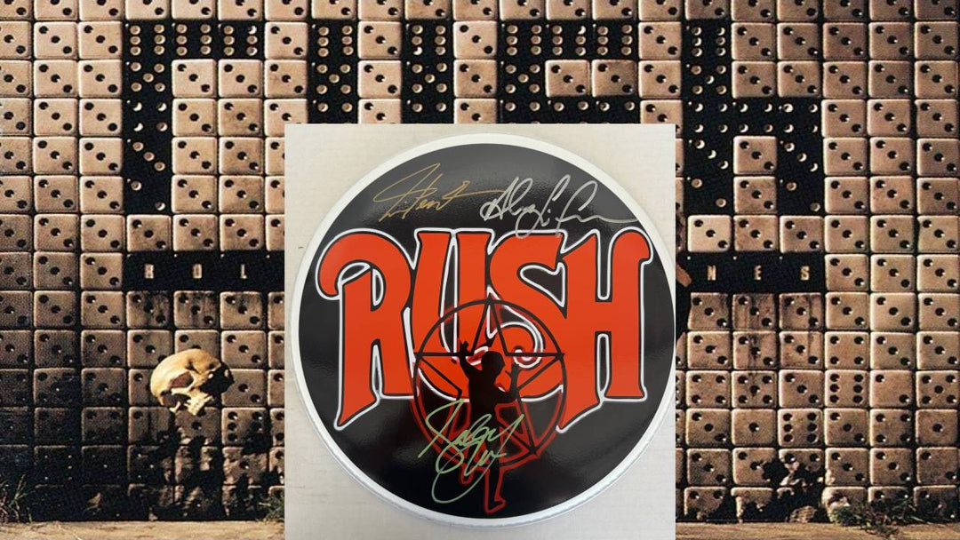 Geddy Lee Alex Lifeson Neil Peart Rush drumhead signed with proof.