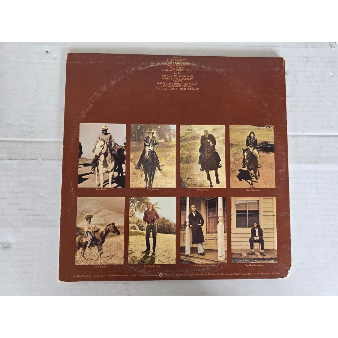 The Doobie Brothers ''Stampede'' LP signed with proof.
