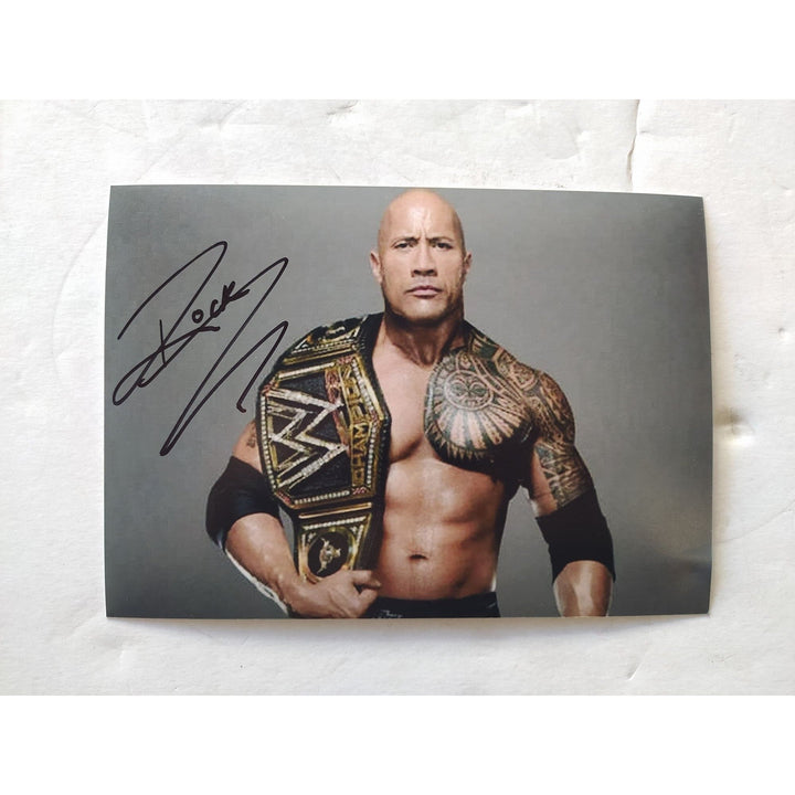 WWE Wrestling Legend "The Rock" signed 5x7 photo with proof Awesome Artifacts