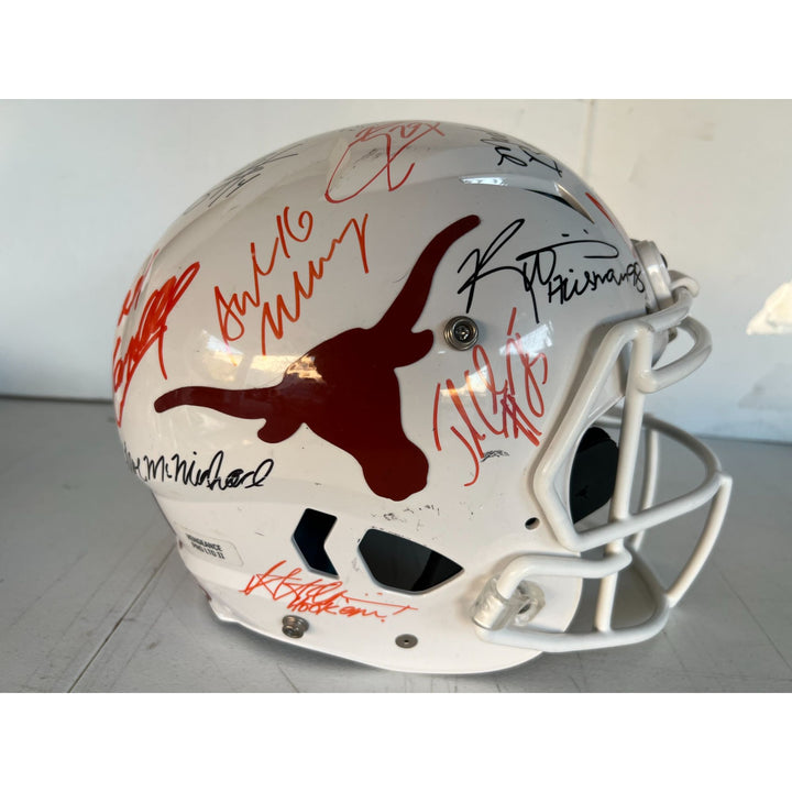 Texas Longhorns all time greats (21) Earl Campbell, Vince Young, Ricky Williams authentic game model Schutt speed helmet signed with proof