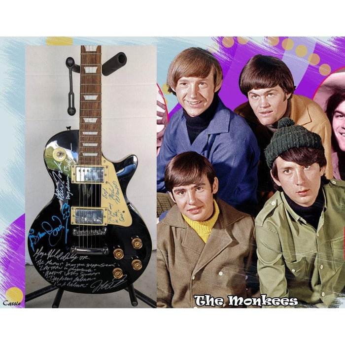 The Monkees Mickey Dolenz, Davey Jones, Michael Nasemith, and Peter York Black Les Paul signed with proof & lyrics