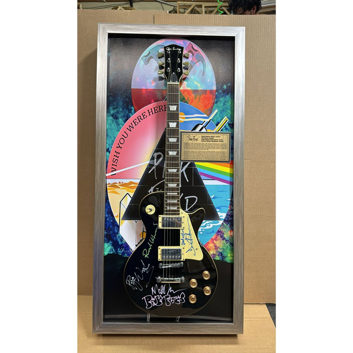 21x44 framed Pink Floyd Roger Waters David Gilmour Richard Wright Nick Mason vintage black les paul electric guitar signed with proof.