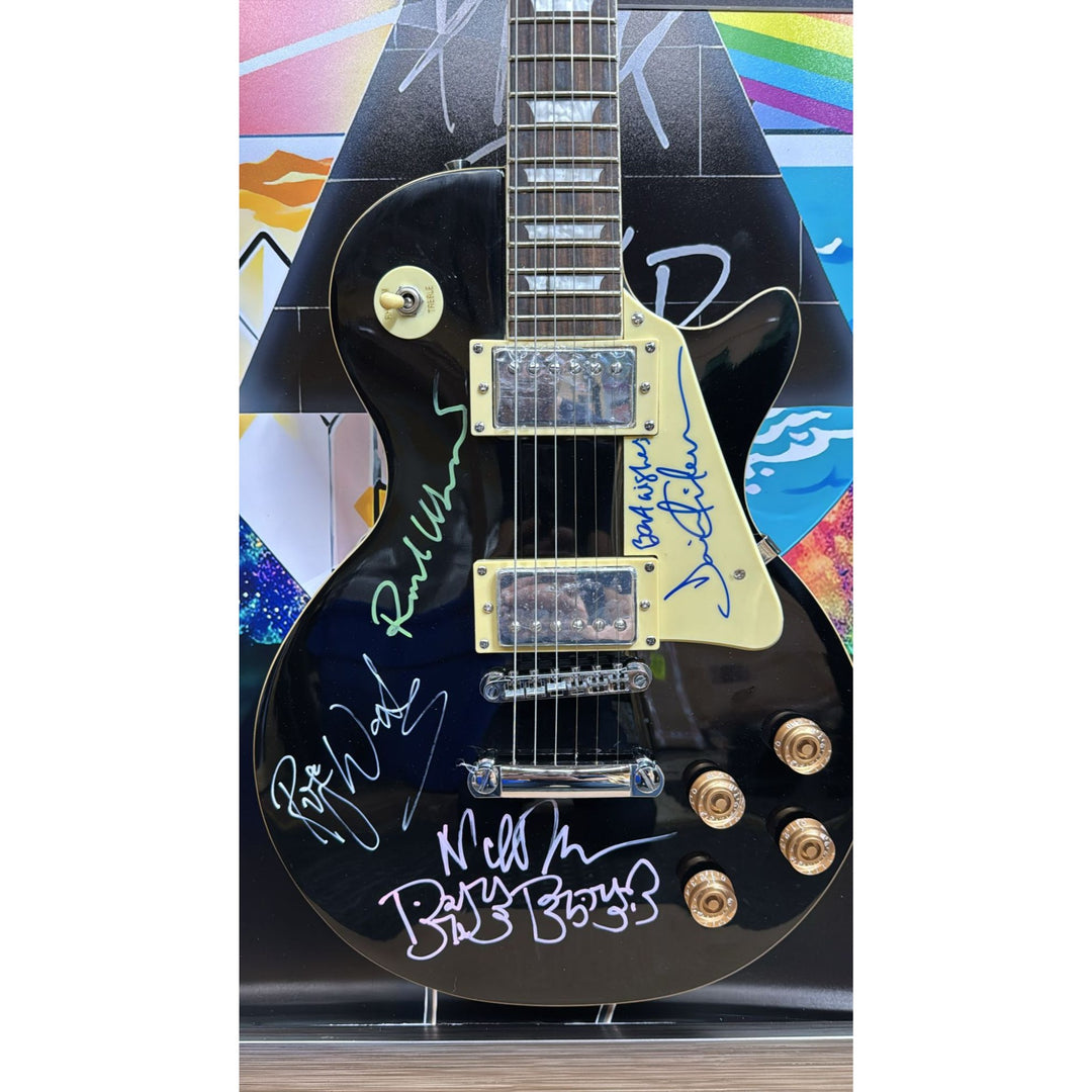 21x44 framed Pink Floyd Roger Waters David Gilmour Richard Wright Nick Mason vintage black les paul electric guitar signed with proof.
