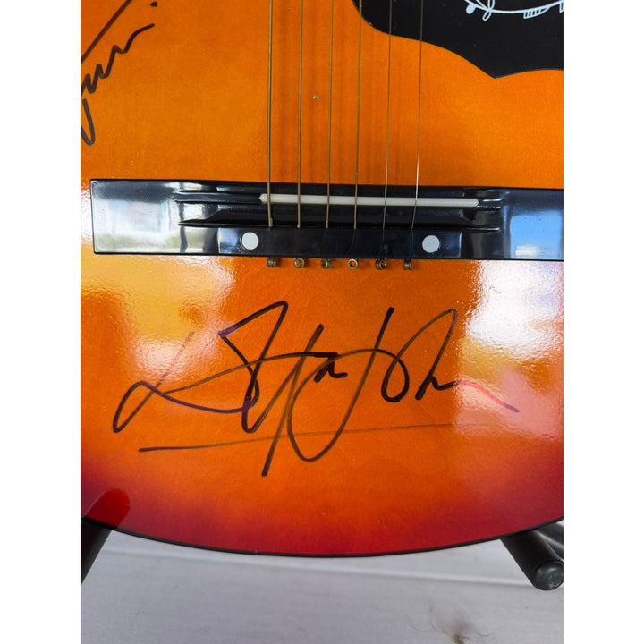 Bernie Taupin and Elton John vintage acoustic guitar signed with proof