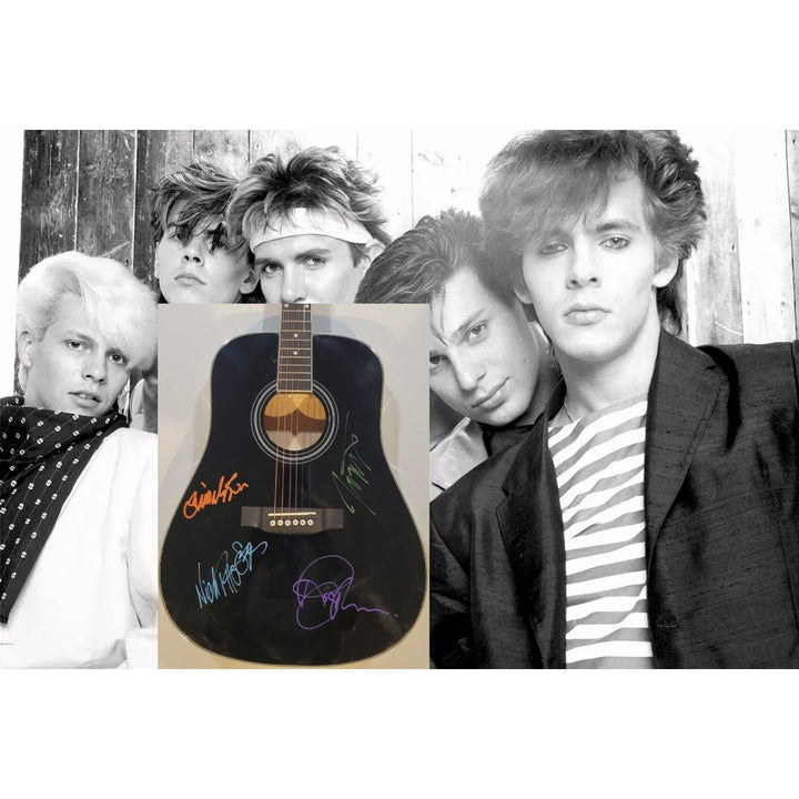 Duran Duran Simon Le Bon Nick Rhodes John and Andy Taylor full size acoustic guitar signed with proof.