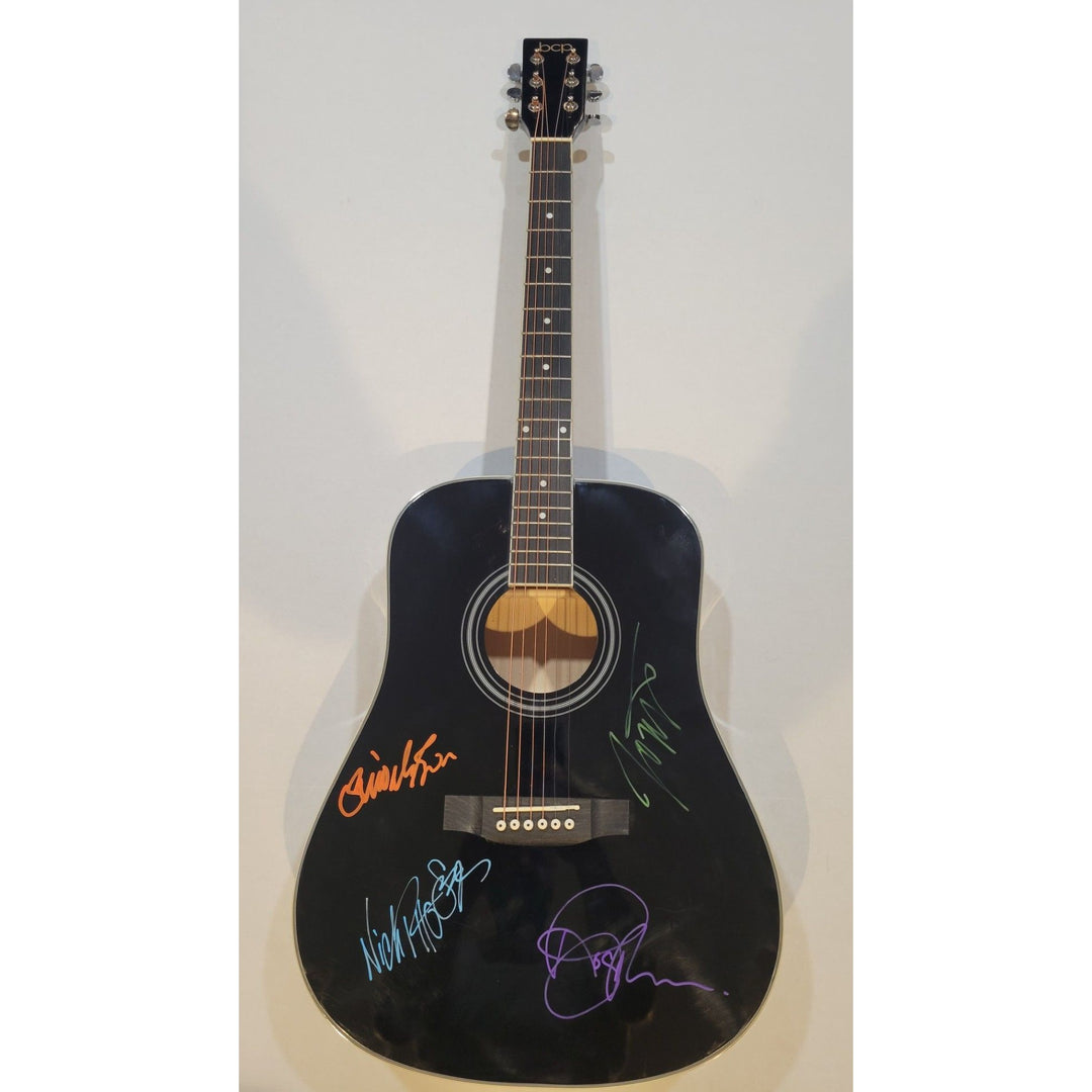 Duran Duran Simon Le Bon Nick Rhodes John and Andy Taylor full size acoustic guitar signed with proof.