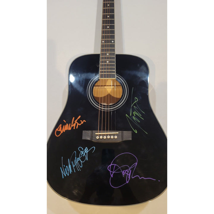 Duran Duran Simon Le Bon Nick Rhodes John and Andy Taylor full size acoustic guitar signed with proof.