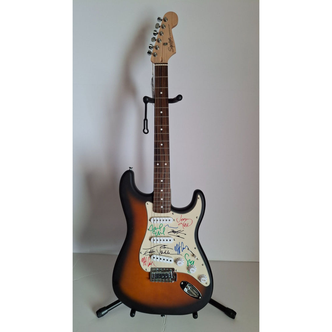 Pearl Jam, Eddie Vedder, Stone Gossard, Matt McCready, Matt Cameron, Jeff Amen, Fender Stratocaster Squier electric guitar signed with proof