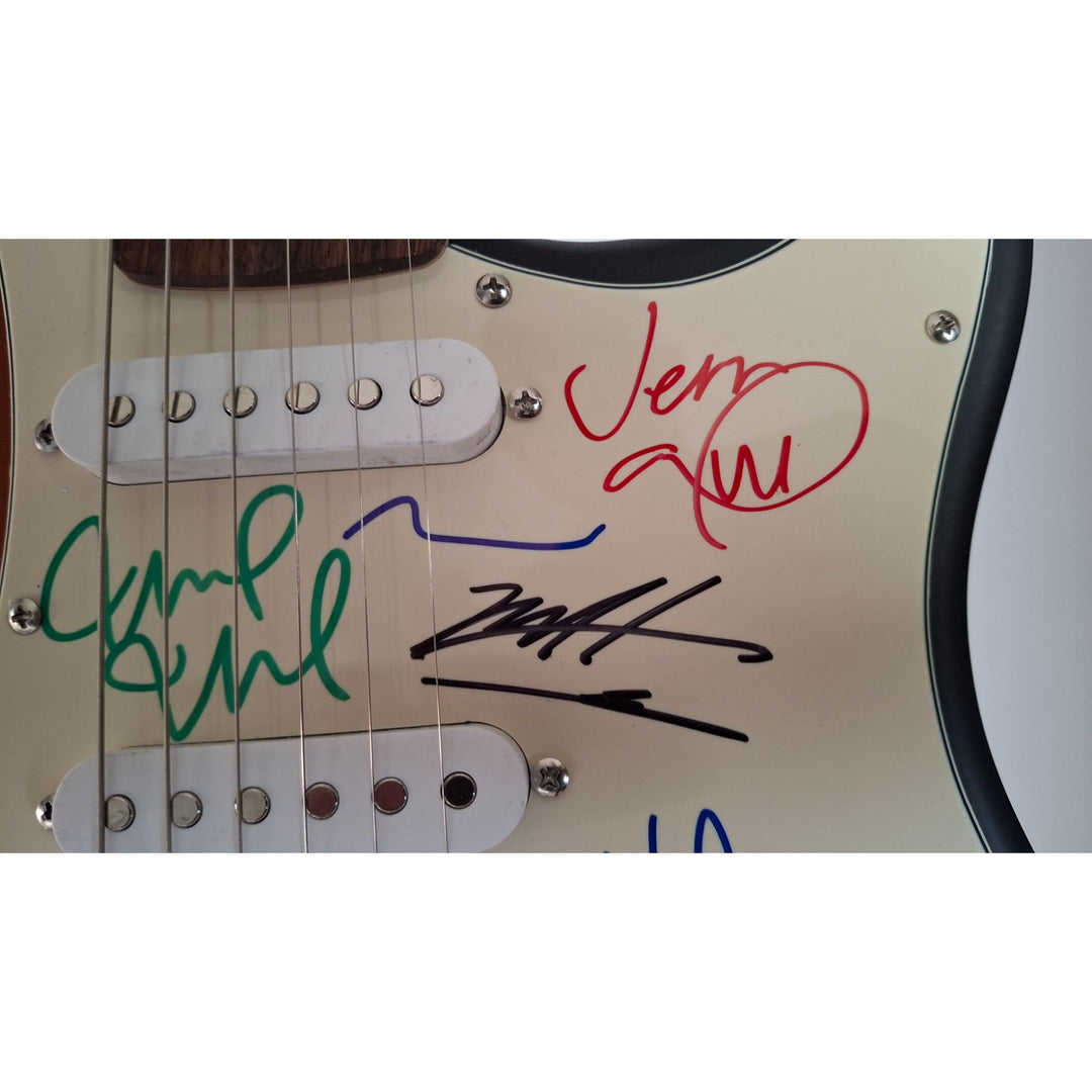 Pearl Jam, Eddie Vedder, Stone Gossard, Matt McCready, Matt Cameron, Jeff Amen, Fender Stratocaster Squier electric guitar signed with proof