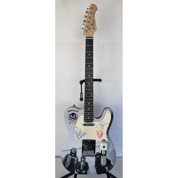 Lemmy Kilmister, guitarist Larry Wallis and drummer Lucas Fox Motörhead "One of a Kind" telecaster full size electric guitar signed.