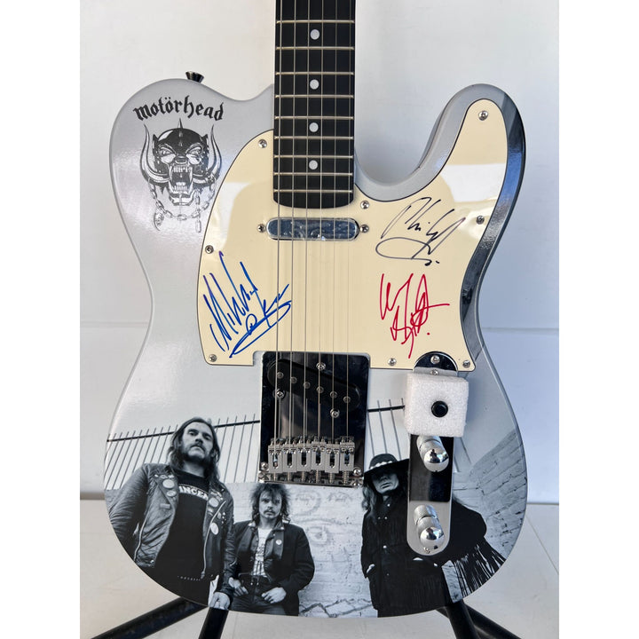 Lemmy Kilmister, guitarist Larry Wallis and drummer Lucas Fox Motörhead "One of a Kind" telecaster full size electric guitar signed.