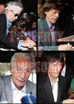 Load image into Gallery viewer, Bill Wyman, Ronnie Wood, Keith Richards, Mick Jagger, Charlie Watts The Rolling Stones Fender Stratocaster guitar pickguard signed with proof
