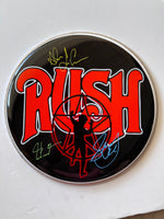 Load image into Gallery viewer, Rush Geddy Lee, Neil Peart, Alex Lifeson one-of-a-kind drumhead signed with proof
