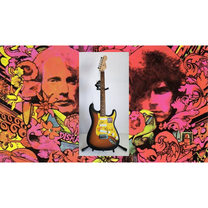Cream, Eric Clapton, Ginger Baker, Jack Bruce, authentic Fender Stratocaster electric guitar signed with proof