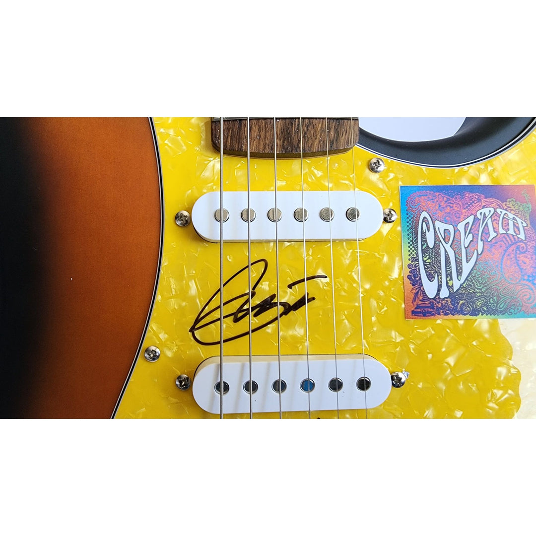Cream, Eric Clapton, Ginger Baker, Jack Bruce, authentic Fender Stratocaster electric guitar signed with proof