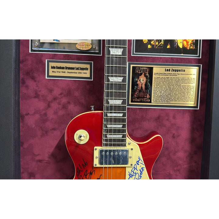 Led Zeppelin Jimmy Page Robert Plant John Paul Jones signed with inscriptions plus John Bonham concert ticket signed and framed with proof.