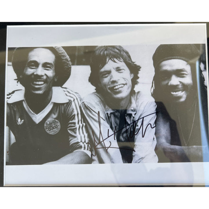 Reggae icons Bob Marley (Autograph book page) & Peter Tosh (concert ticket signed) and Rolling Stones lead singer Mick Jagger (8x10 signed)