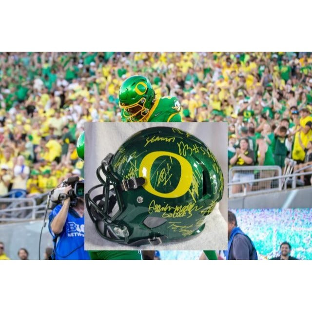 Oregon Ducks Dan Lanning Dillon Gabriel, Traeshon Holden, Evan Stewart Jordan James 2024 team signed Riddell full size helmet signed