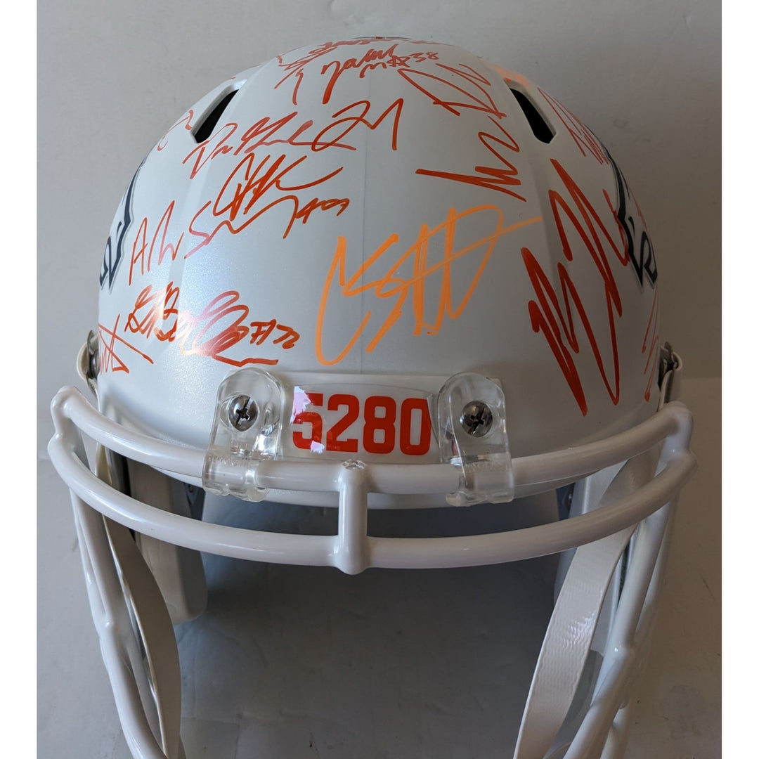 Denver Broncos 2025 team signed Riddel Speed full size helmet signed with proof