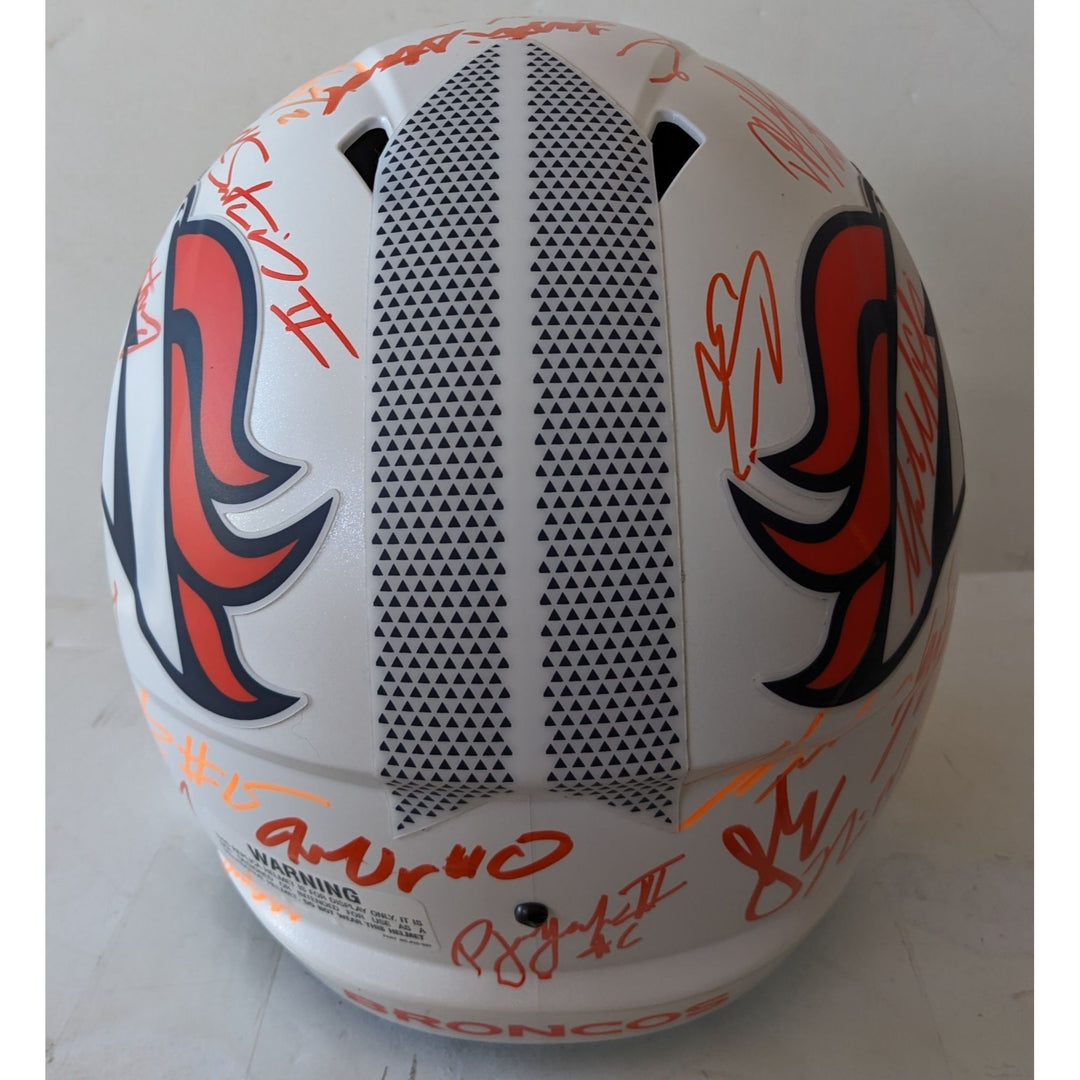 Denver Broncos 2025 team signed Riddel Speed full size helmet signed with proof