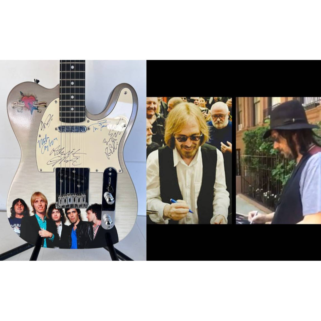 Tom Petty (with sketch) and The Heartbreakers, Ron Blair, Benmont Tench, Scott Thurston, and Mike Campbell full size electric guitar signed.
