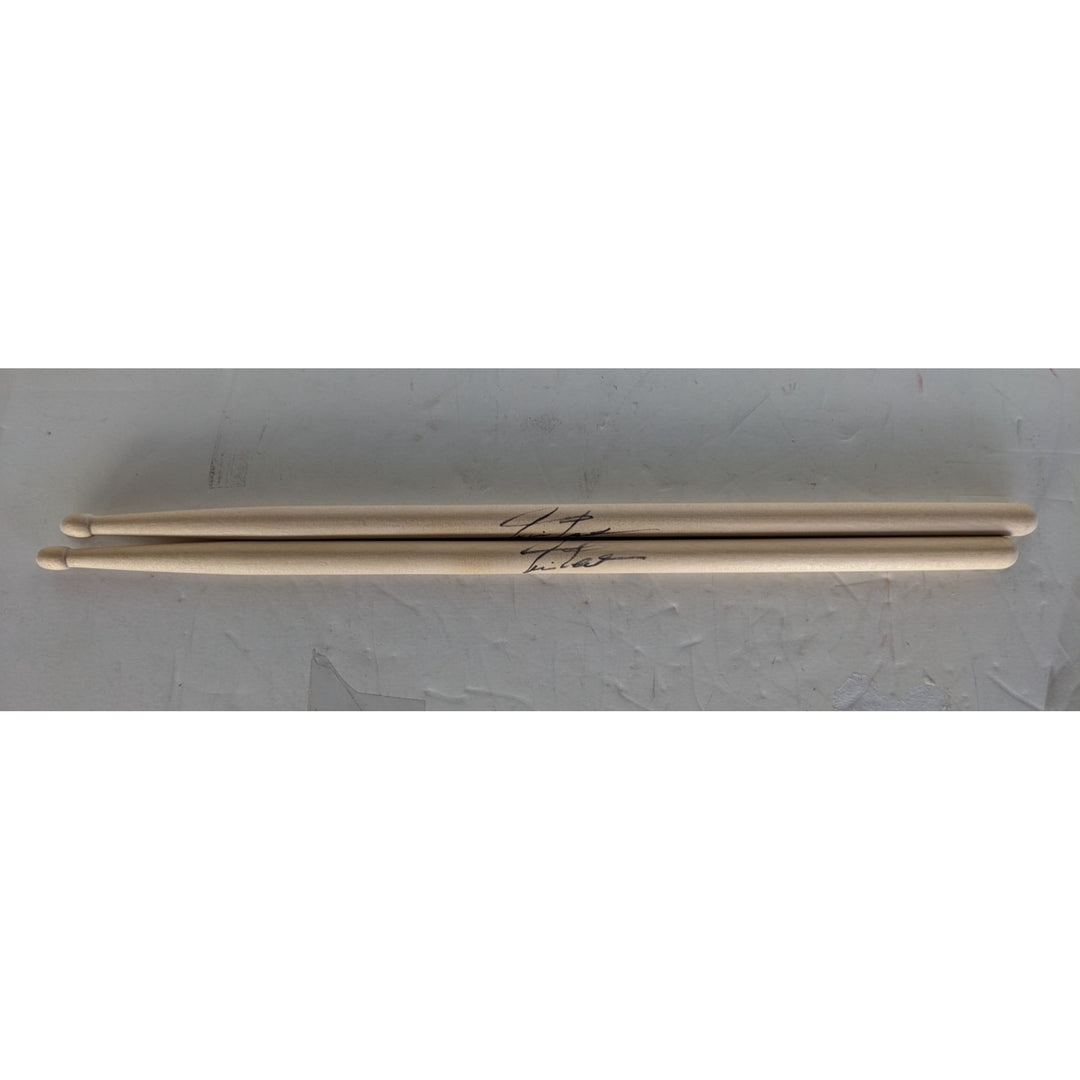 Neil Peart Rush pair of drumsticks signed with proof