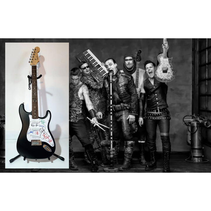 Rammstein: Till Lindemann, Richard Z. Kruspe, Oliver Riedel, Paul Landers, Christian Lorenz & Christoph Schneider Fender Stratocaster signed with proof