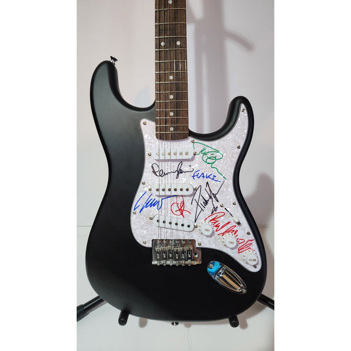 Rammstein: Till Lindemann, Richard Z. Kruspe, Oliver Riedel, Paul Landers, Christian Lorenz & Christoph Schneider Fender Stratocaster signed with proof