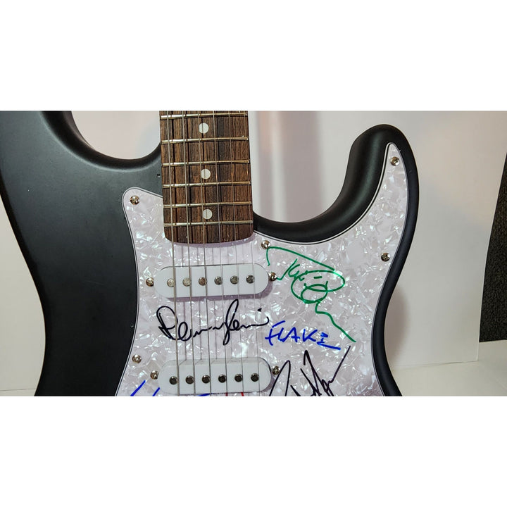 Rammstein: Till Lindemann, Richard Z. Kruspe, Oliver Riedel, Paul Landers, Christian Lorenz & Christoph Schneider Fender Stratocaster signed with proof
