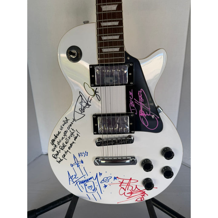 Kiss Gene Simmons Paul Stanley Ace Freehly and Peter Criss vintage White les paul guitar signed with proof and inscriptions