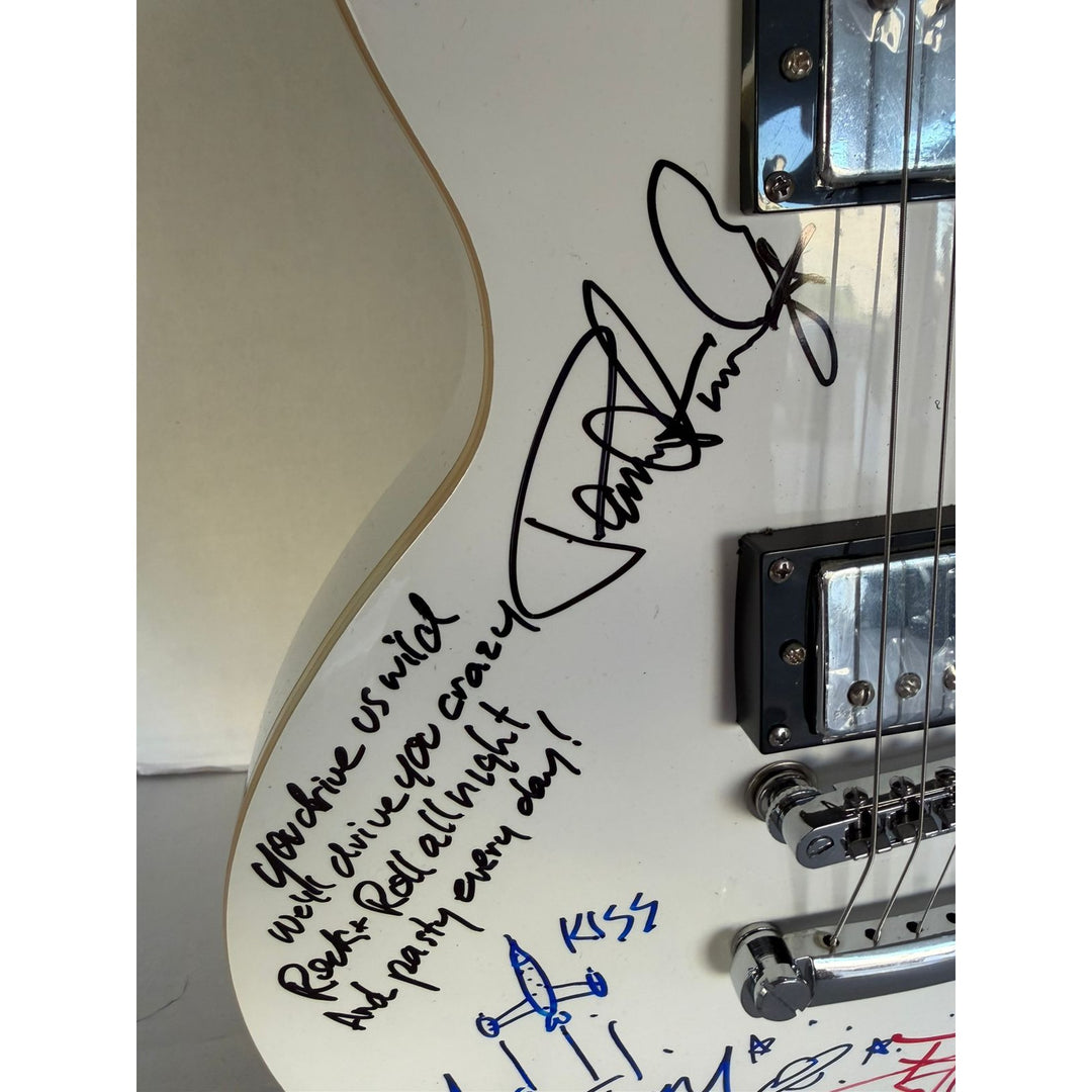 Kiss Gene Simmons Paul Stanley Ace Freehly and Peter Criss vintage White les paul guitar signed with proof and inscriptions
