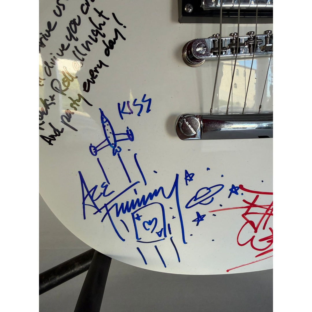 Kiss Gene Simmons Paul Stanley Ace Freehly and Peter Criss vintage White les paul guitar signed with proof and inscriptions