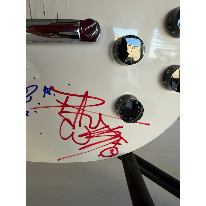Kiss Gene Simmons Paul Stanley Ace Freehly and Peter Criss vintage White les paul guitar signed with proof and inscriptions
