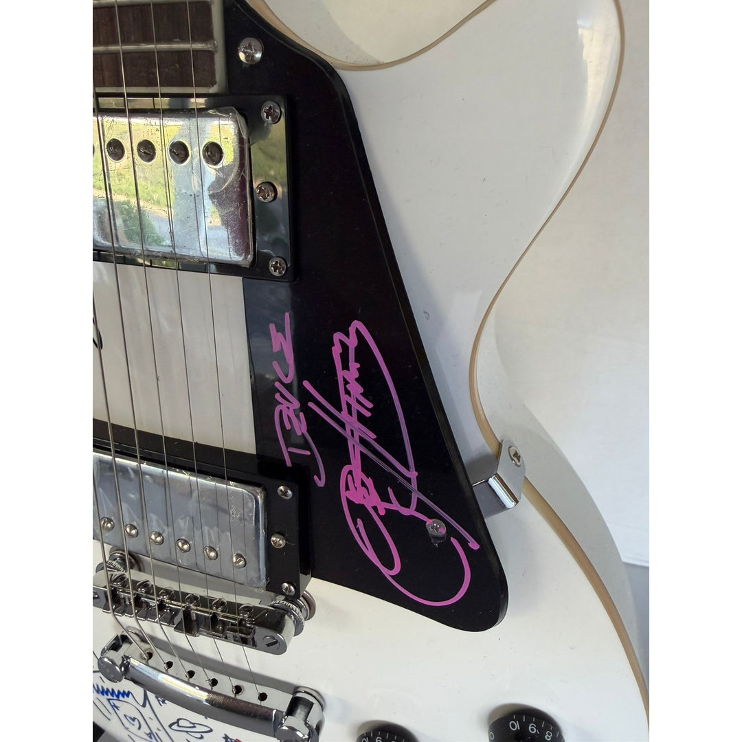 Kiss Gene Simmons Paul Stanley Ace Freehly and Peter Criss vintage White les paul guitar signed with proof and inscriptions